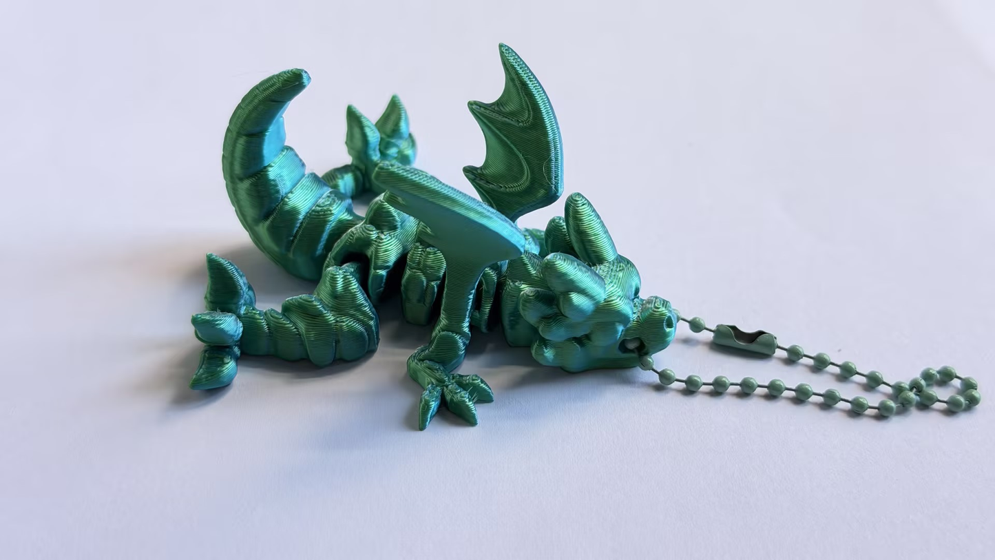 3D-printed dinosaur keychain