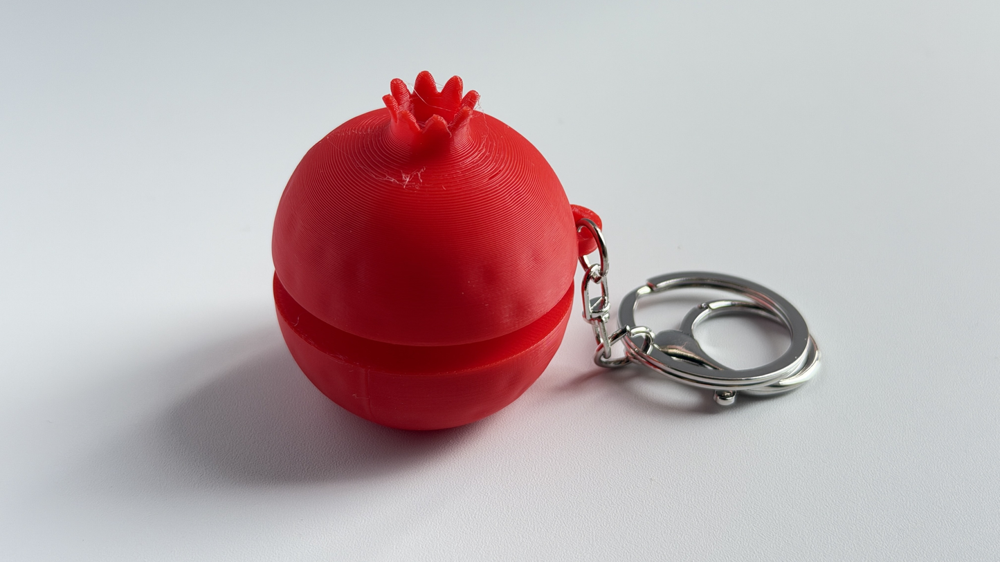 3D-printed pomegranate push-button keychain/charm