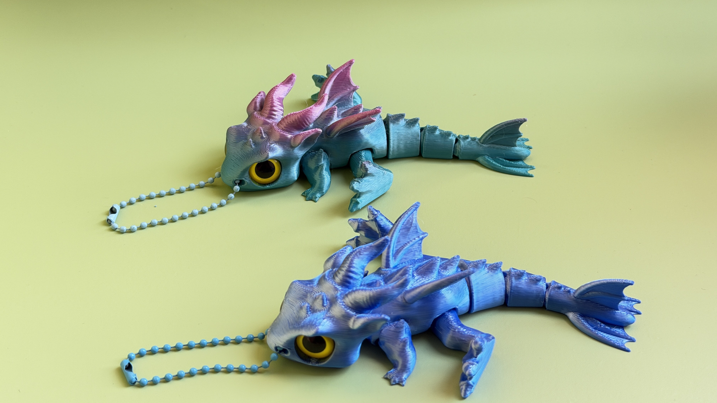 3D-printed dinosaur keychain/charm