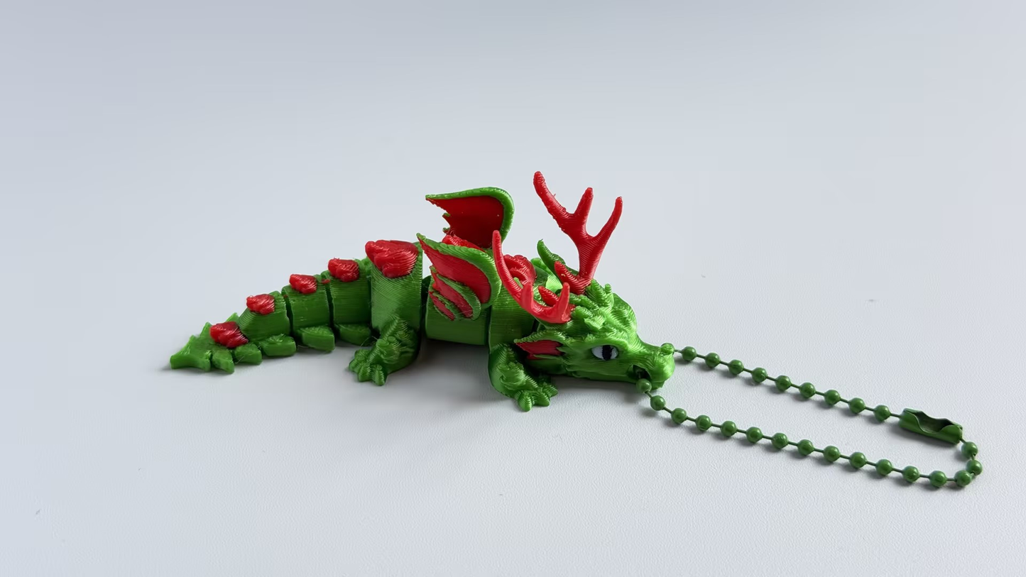 3D-printed Christmas dinosaur keychain