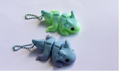 3D-printed dinosaur keychain