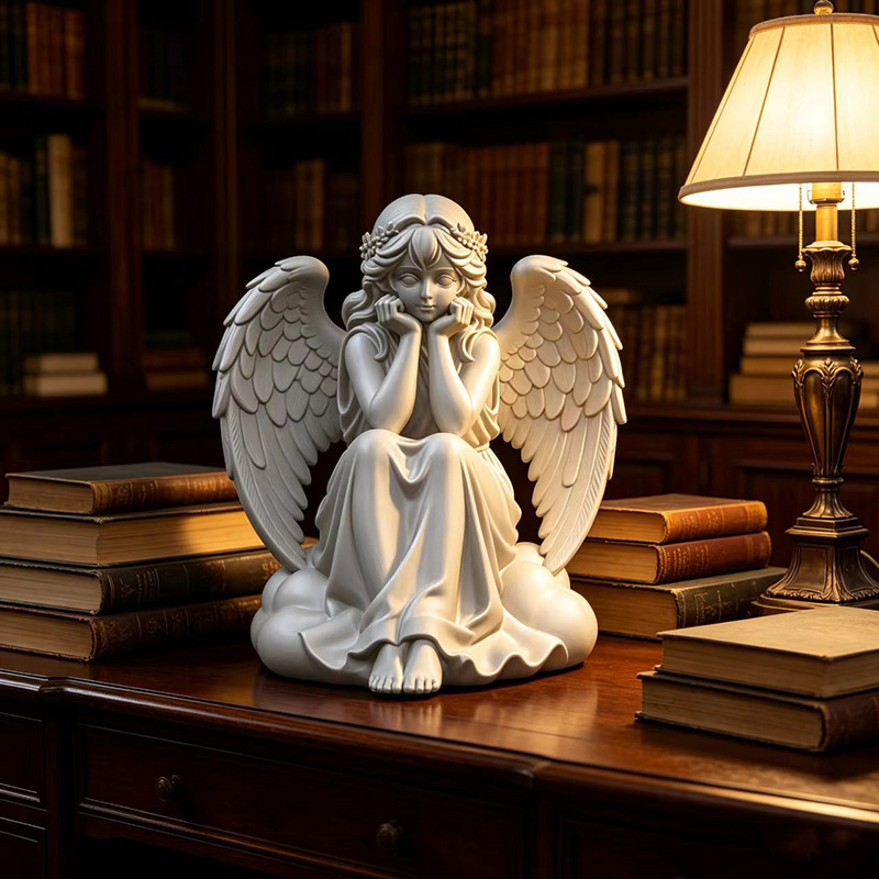 3D-printed white angel sculpture (weeping with face covered)