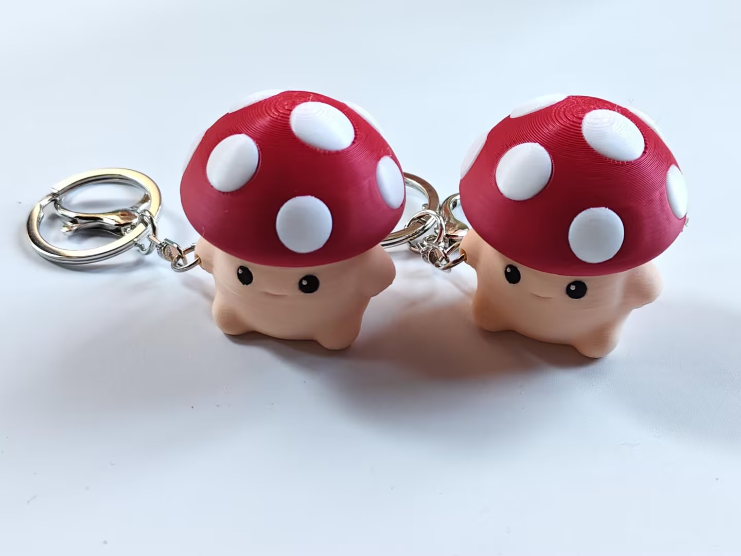 3D-printed red mushroom keychain charm