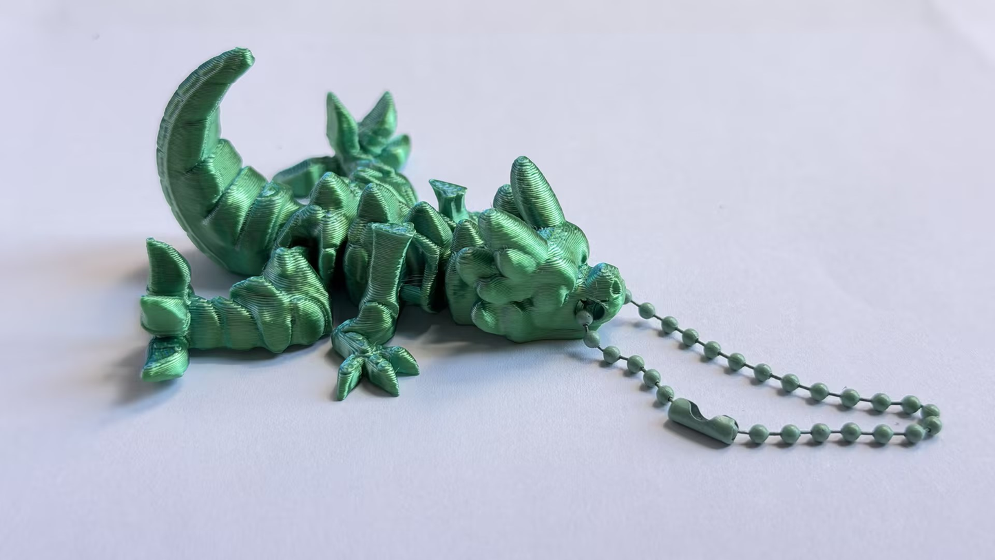 3D-printed dinosaur keychain
