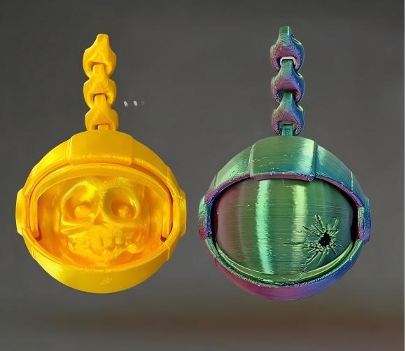 3D printed articulated skull-astronaut helmet keychain
