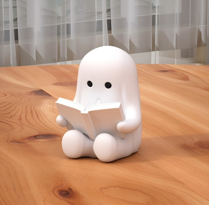 3D printed Halloween ghost figurine reading a book
