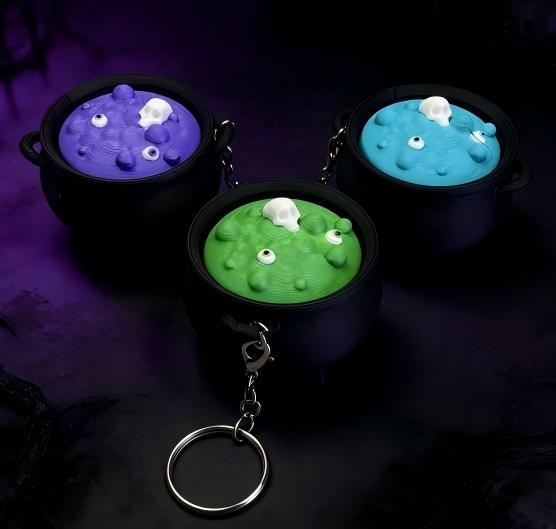 3D-printed witch's cauldron push-action keychain charm