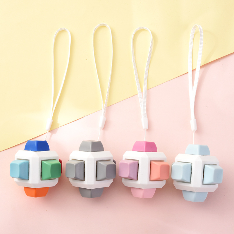 Hexahedron mechanical button stress-relief keychain charm