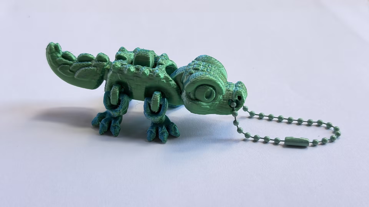 3D-printed dinosaur keychain