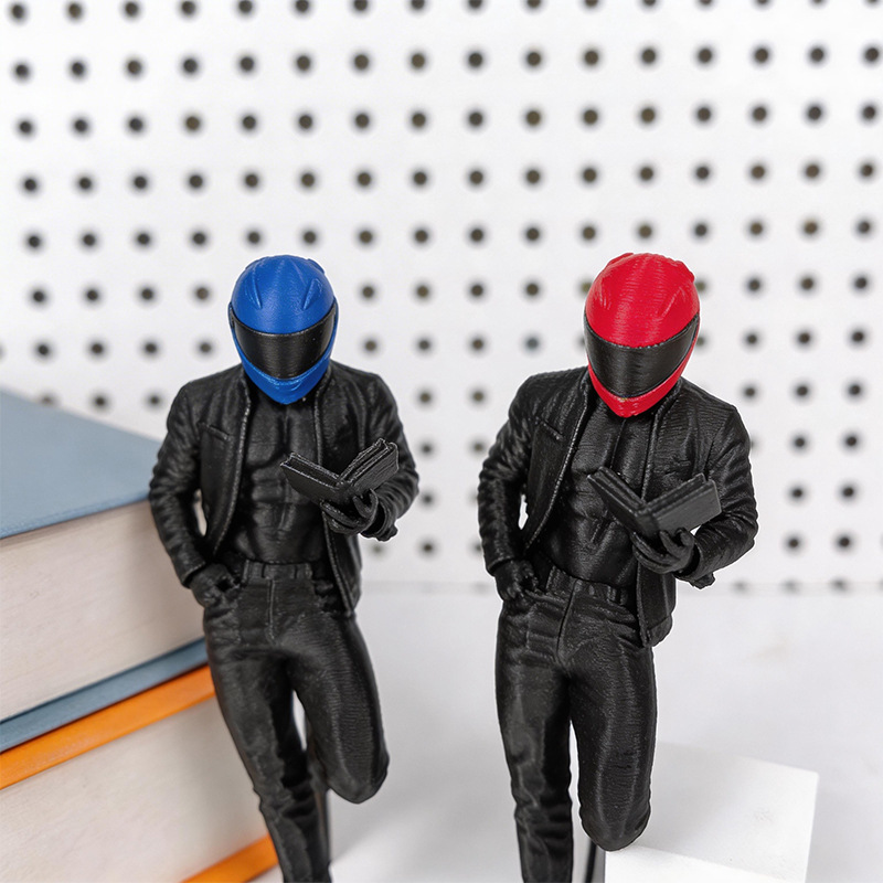 3D-printed plastic figurine: race car driver with helmet