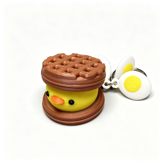 3D-printed cute waffle-chick button clicker keychain charm
