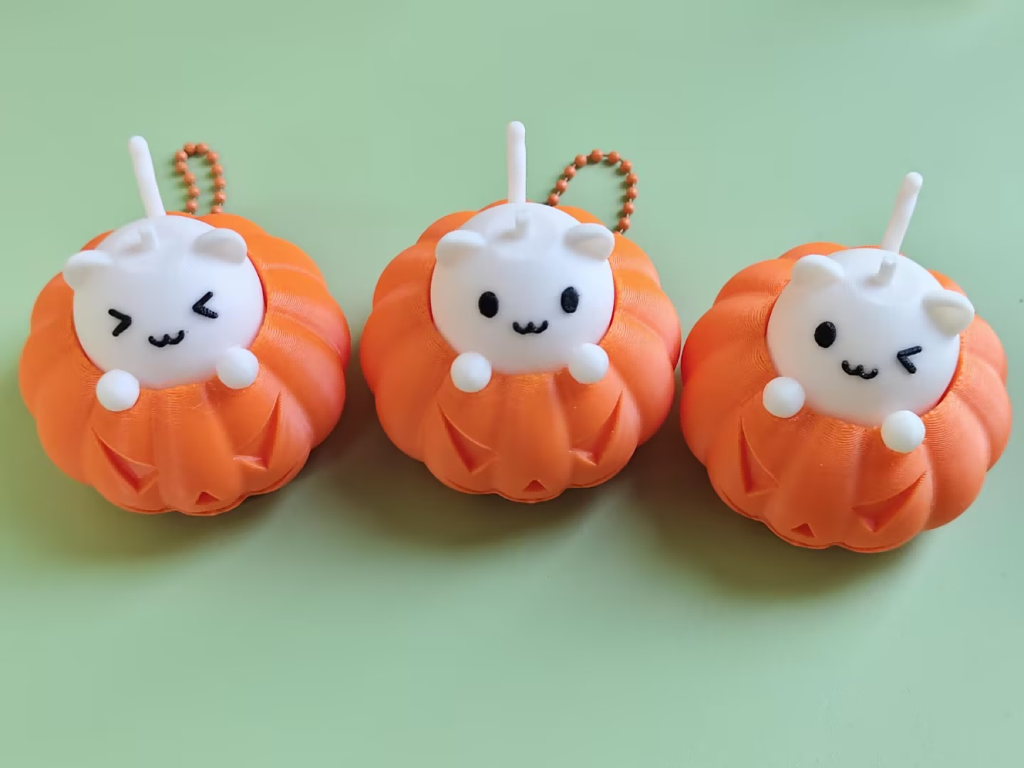 3D printed pumpkin imp push-toy keychain