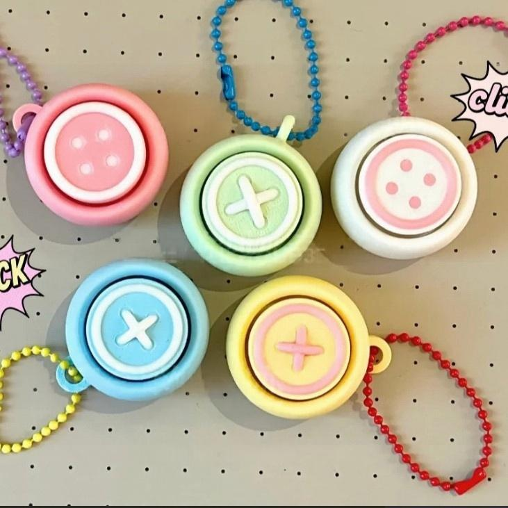 3D-printed button-style clicker keychain charm