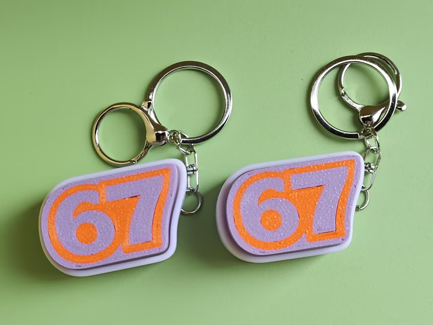 3D printed number push-toy keychain