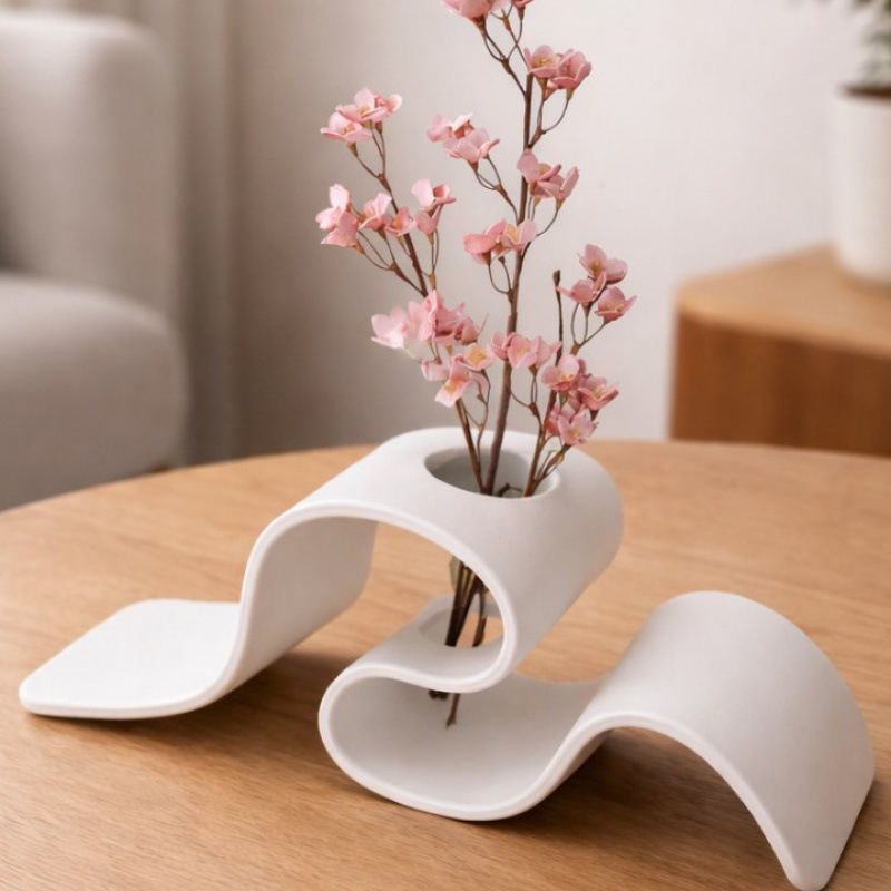 3D-printed minimalist wave-shaped stand for dried flowers