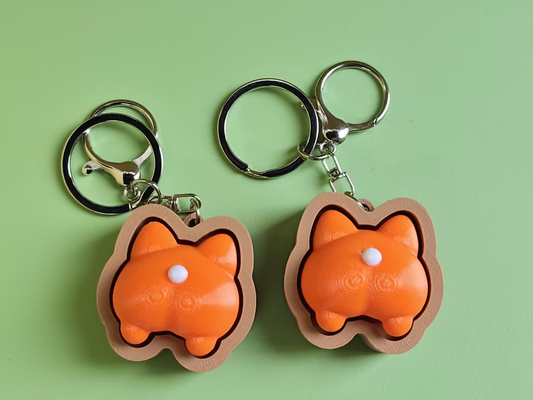 3D printed cat push-toy keychain