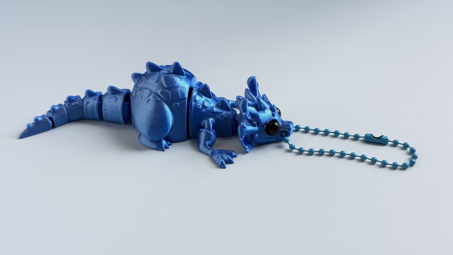 3D-printed dinosaur keychain