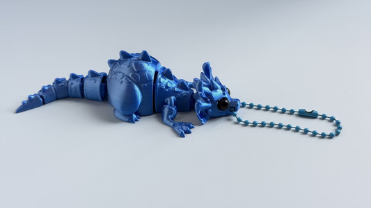 3D-printed dinosaur keychain
