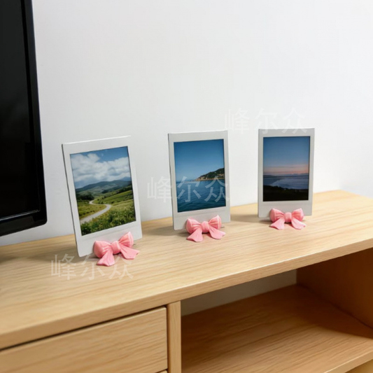 3D-printed bow-shaped photo and memo holder