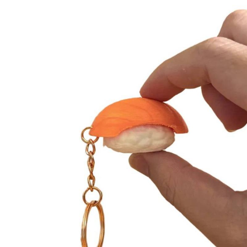 3D-printed stress-relief "clicker" charm