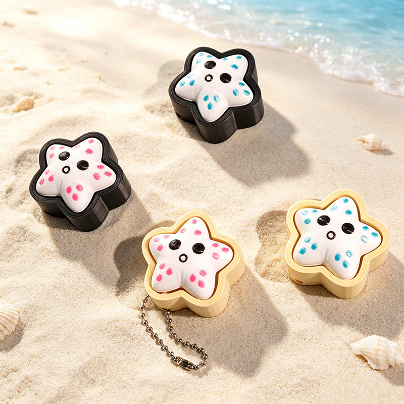 3D-printed stress-relief cartoon-style starfish button keychain charm