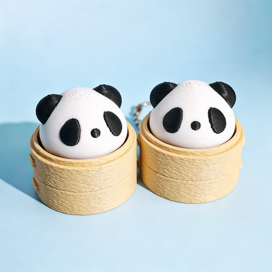 3D-printed panda-bun stress-relief keychain charm