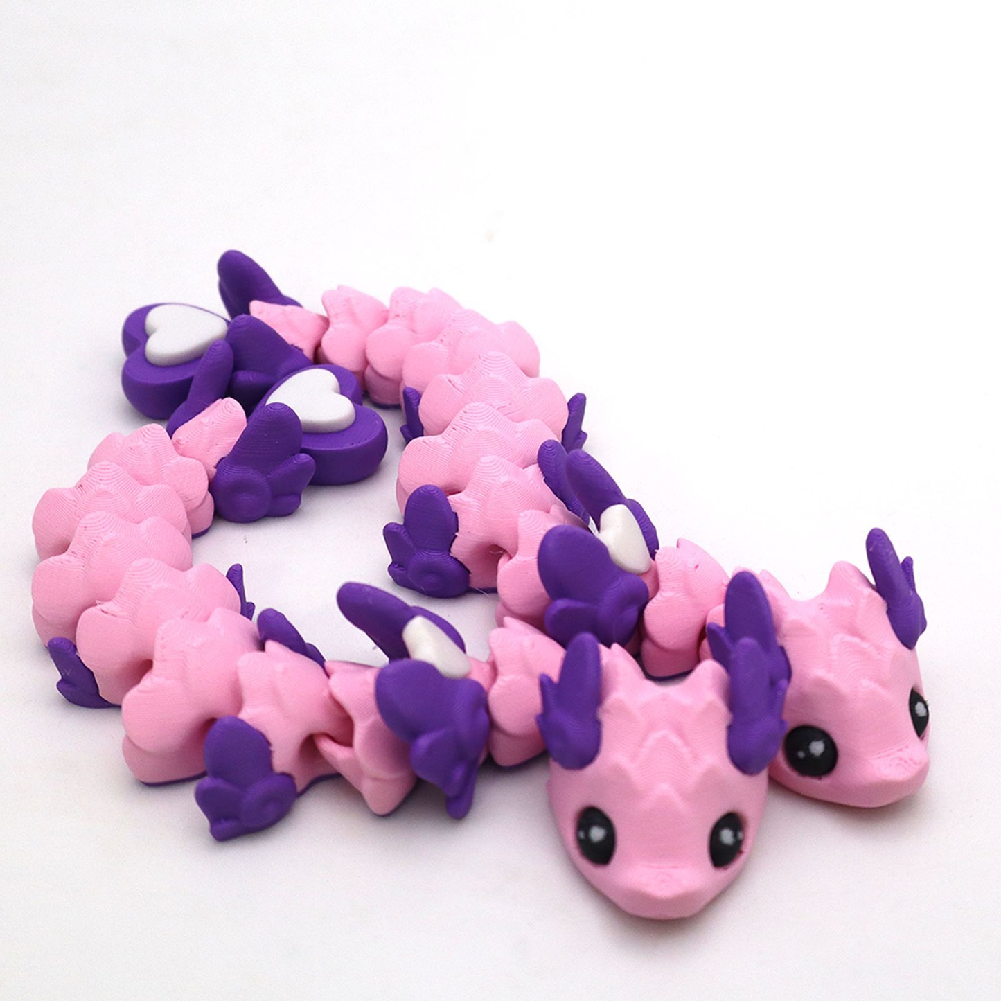 3D-printed multi-colored heart-shaped dragon