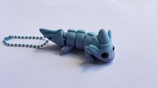 3D-printed dinosaur keychain