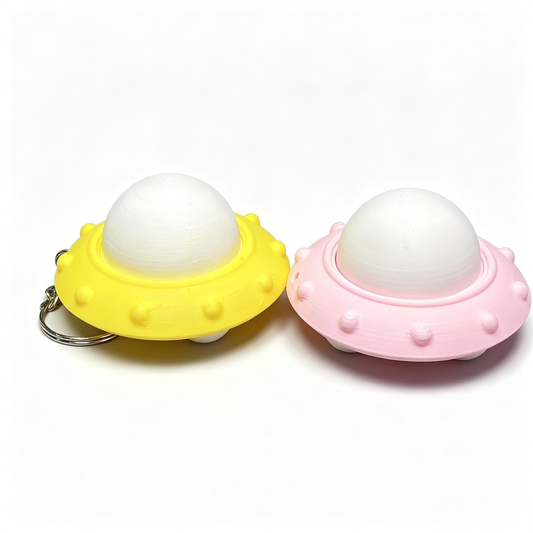 3D-printed UFO button clicker keychain charm