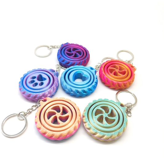 3D-printed spinning top keychain charm