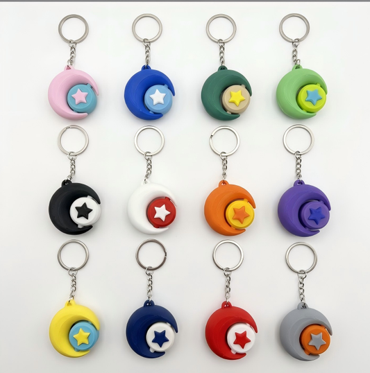 3D-printed sun-and-moon keychain charm