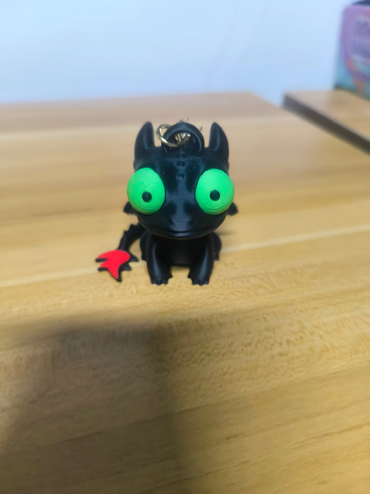 3D-printed dinosaur keychain charm