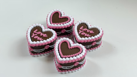 3D-printed heart-shaped cake keycap-style clicker