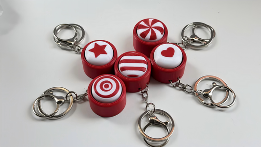 3D-printed symbol-themed keycap-style keychain