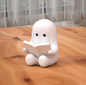 3D printed Halloween ghost figurine reading a book