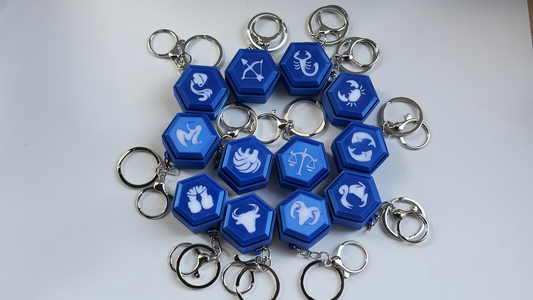 3D-printed zodiac-themed keycap-style keychain