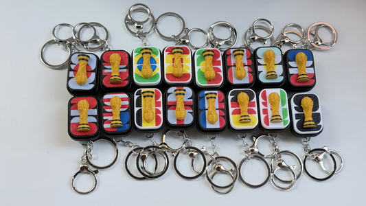 3D-printed trophy-themed keycap-style keychain