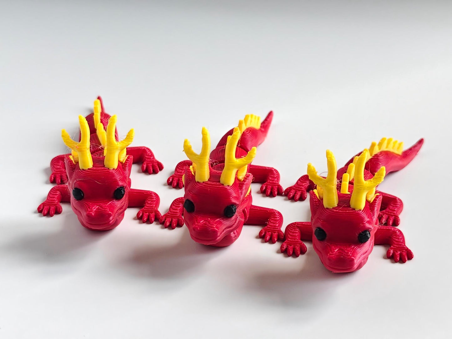 3D-printed red small dragon figurine