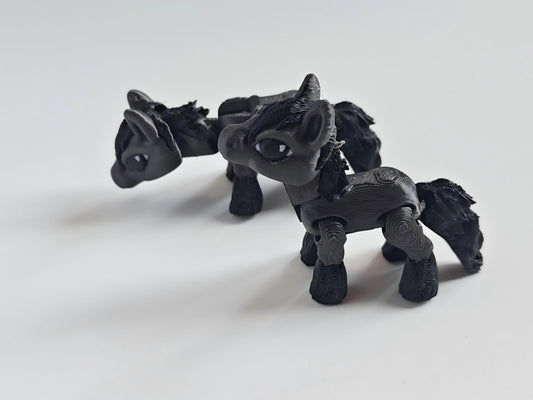 3D-printed black pony figurine
