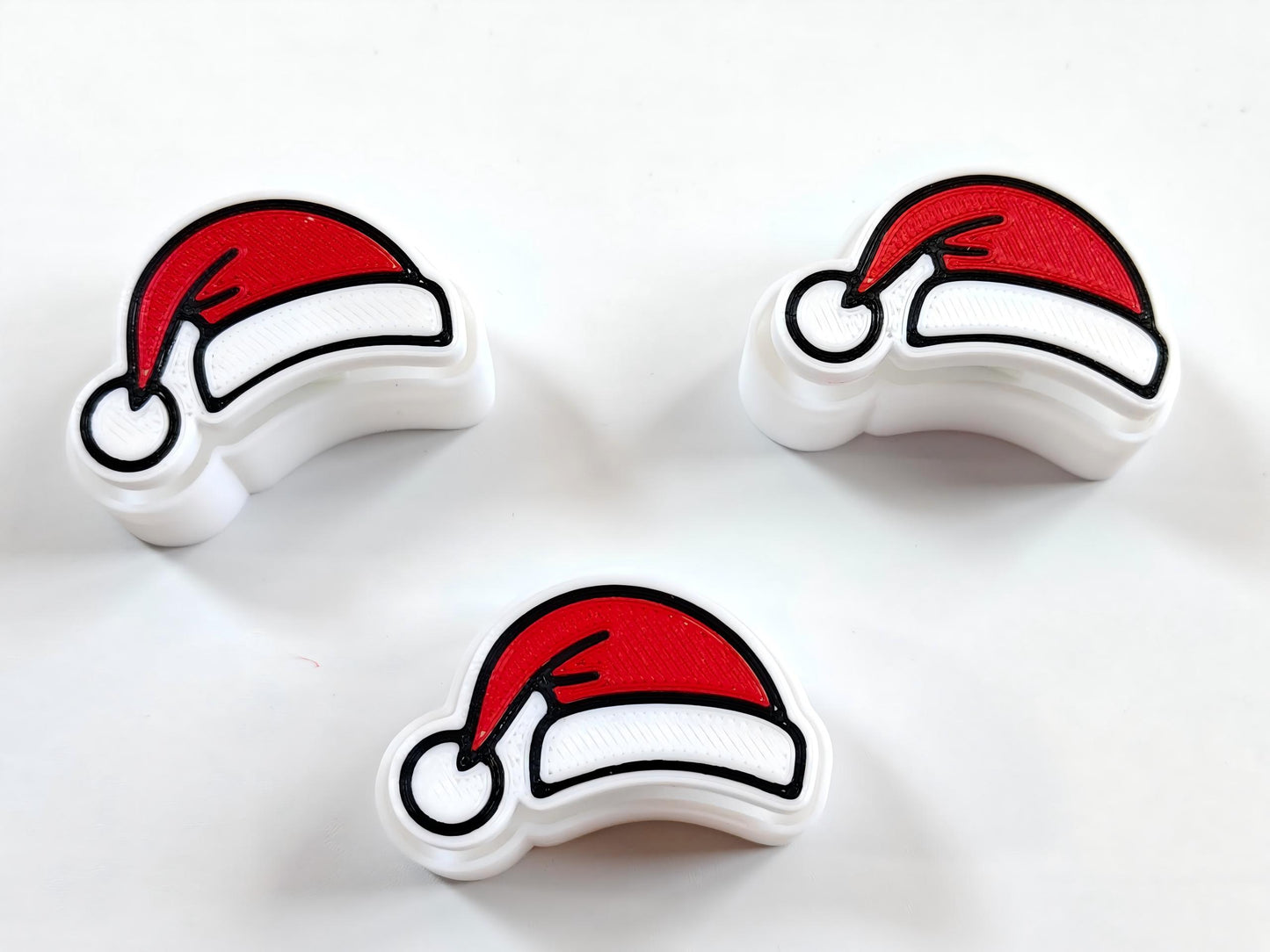 3D-printed Santa hat-shaped clicker