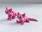 3D-printed pink kitten figurine