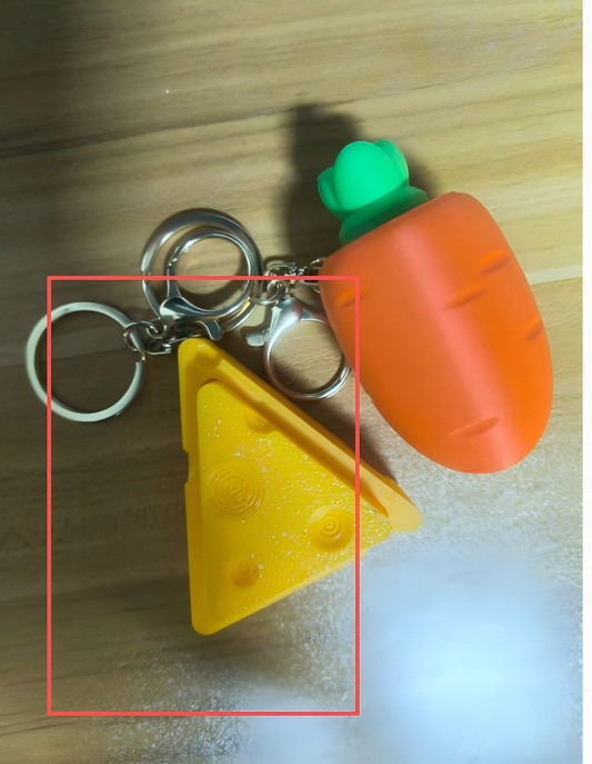 3D-printed cheese wedge keychain charm