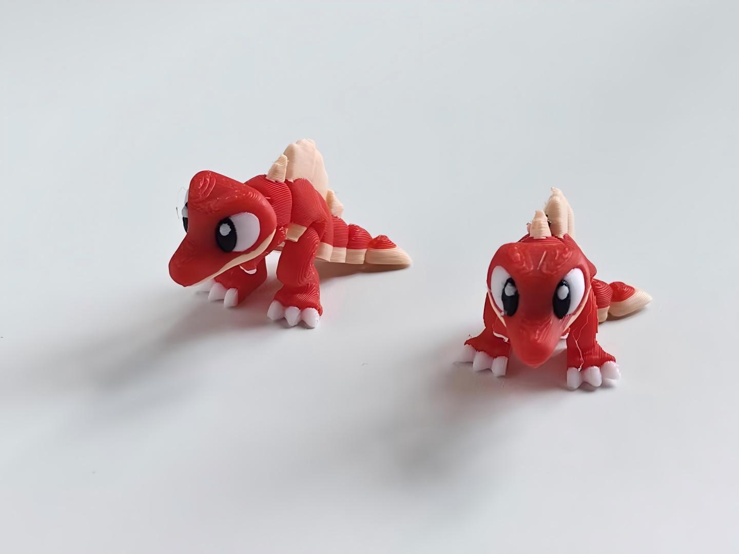 3D-printed red dinosaur figurine