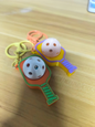 3D-printed tennis racket face keychain charm