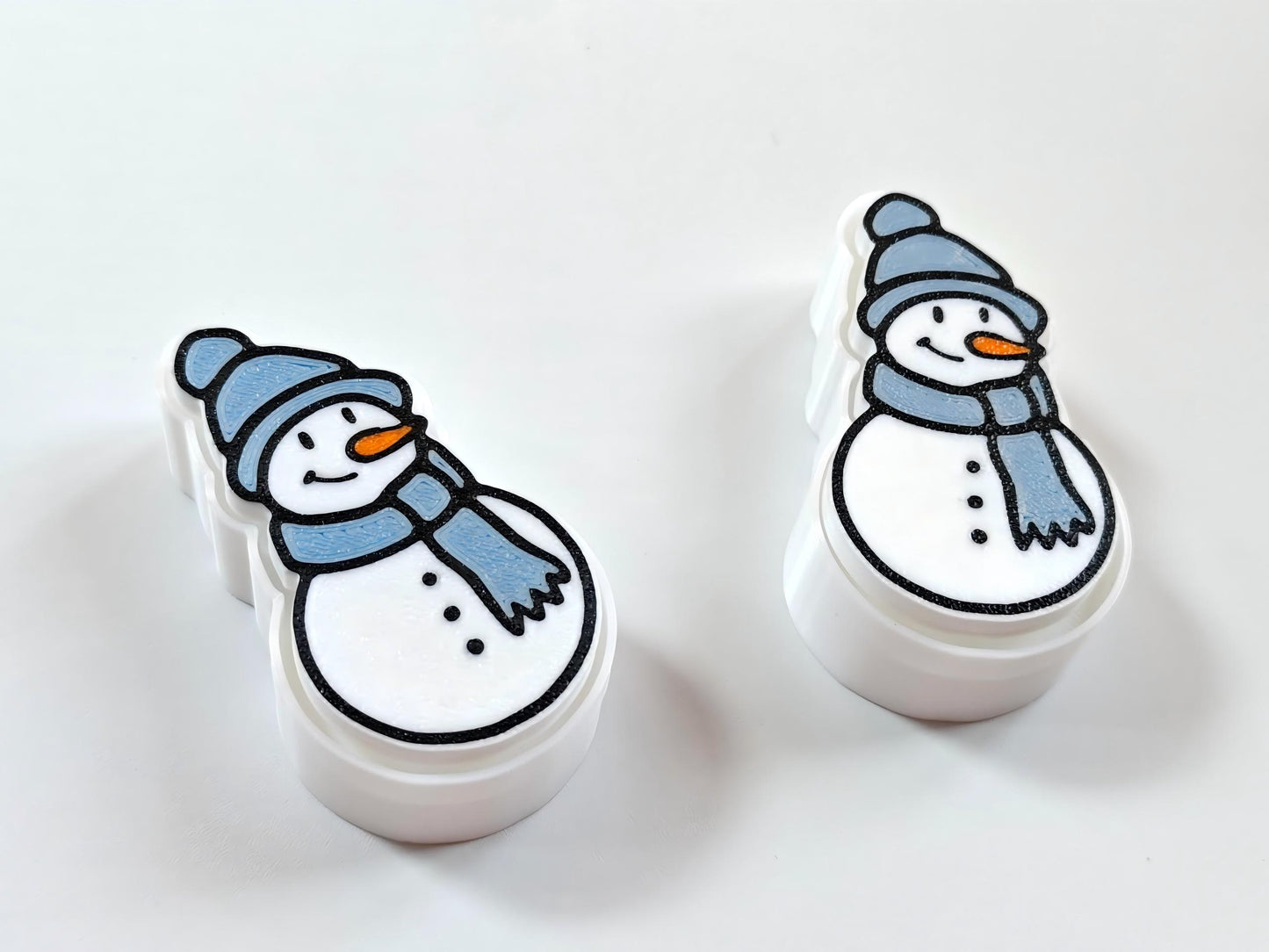 3D-printed snowman figurine with scarf