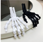 3D-printed Halloween skull with articulated finger joints