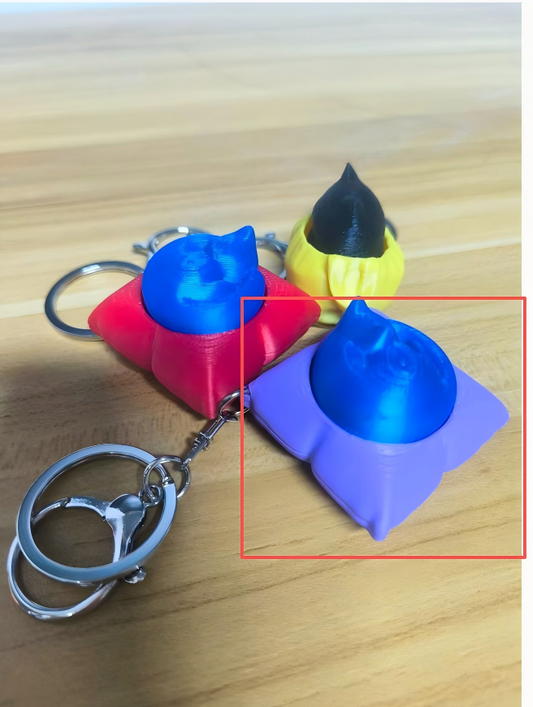 3D-printed Color-blocked pillow cat keychain charm
