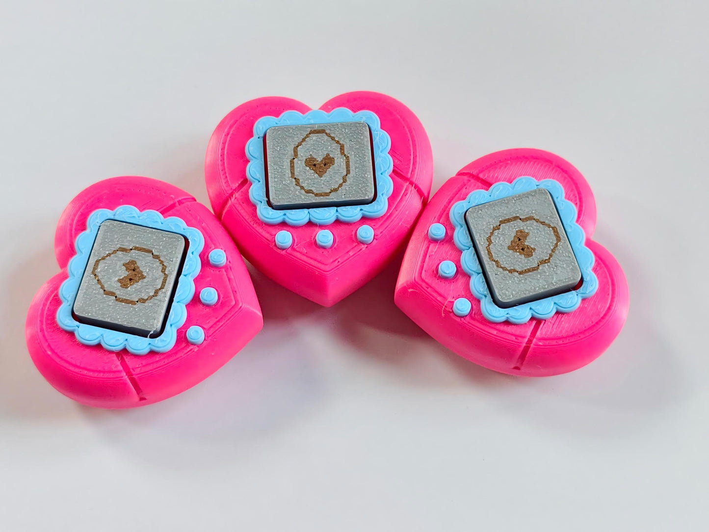 3D-printed heart-shaped electronic-style figurine