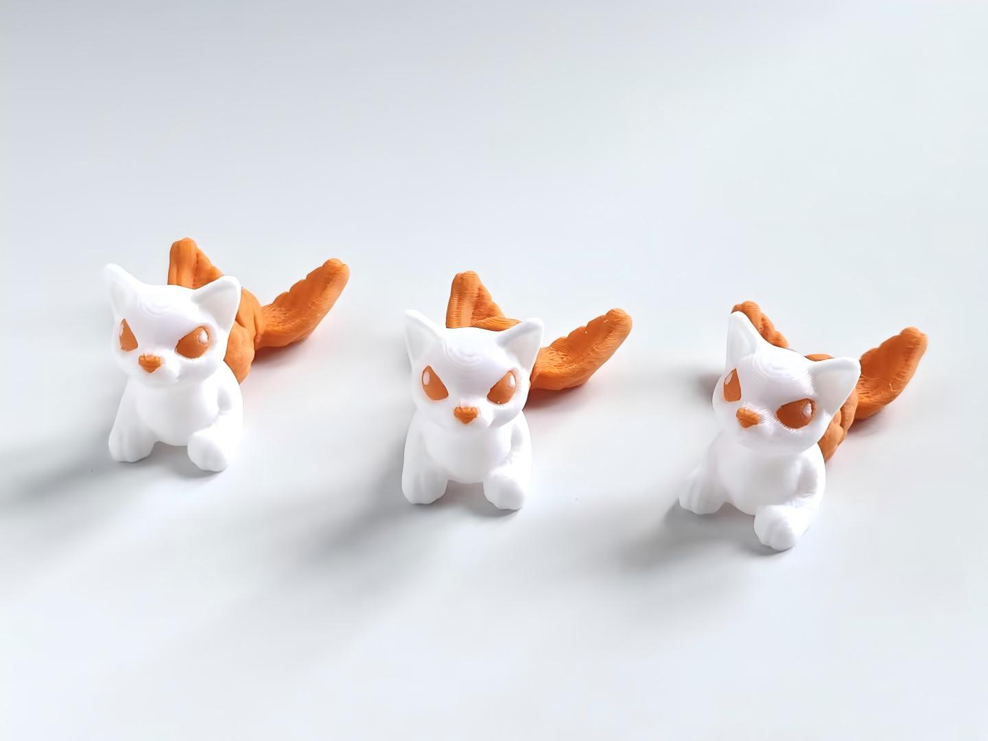 3D printed articulated fox-fish figurine